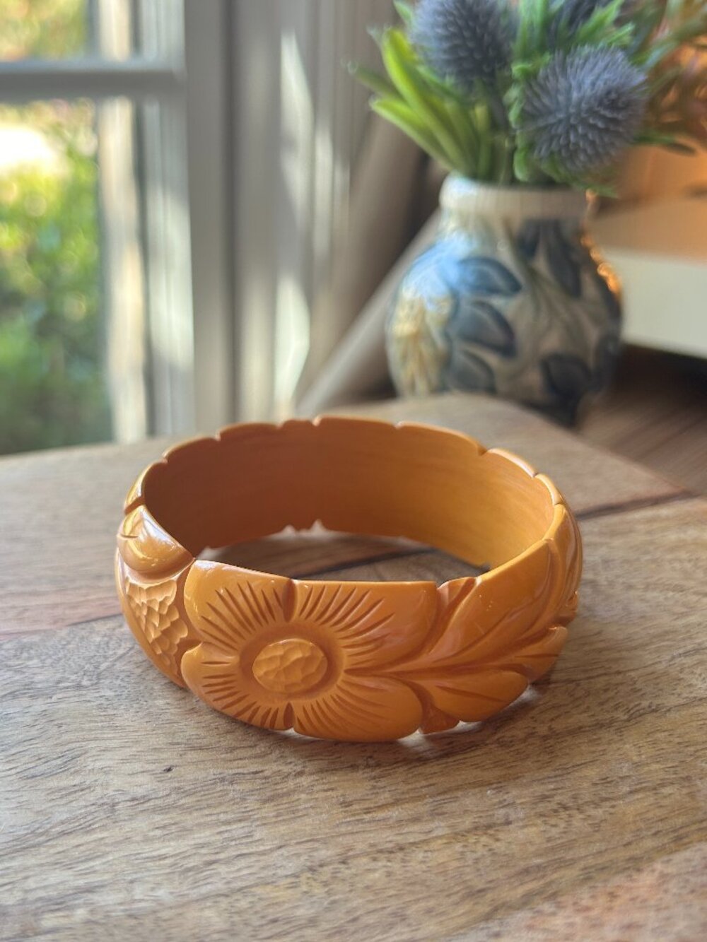 Vintage carved butterscotch bakelite bangle